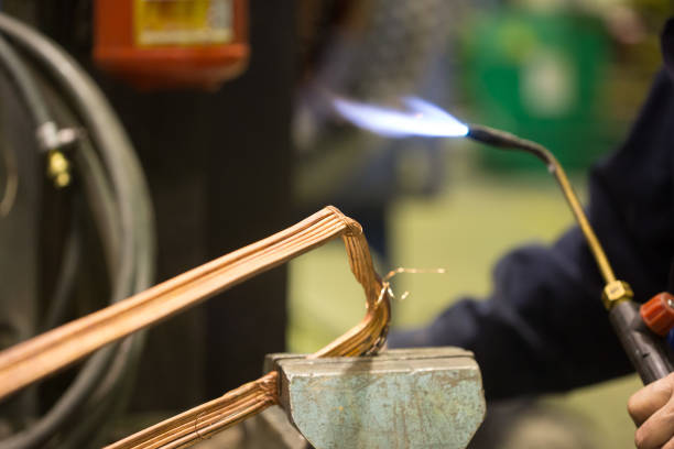 istock repairing transformer and welding copper wire 639506382