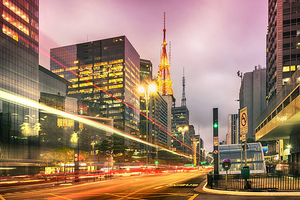 City street showing traffic flow lines with long exposure stock photo