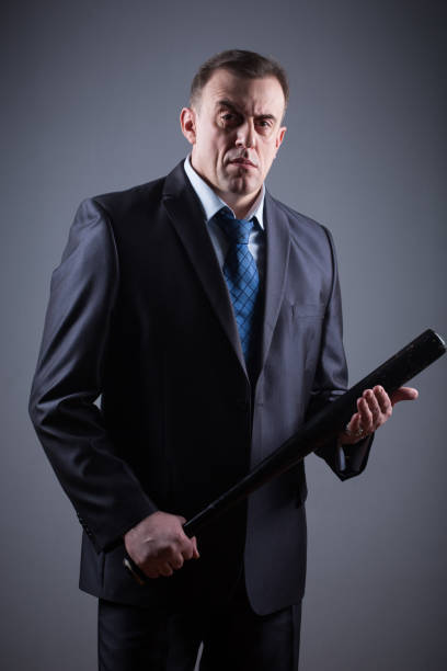 istock male gangster with baseball bat 639510800