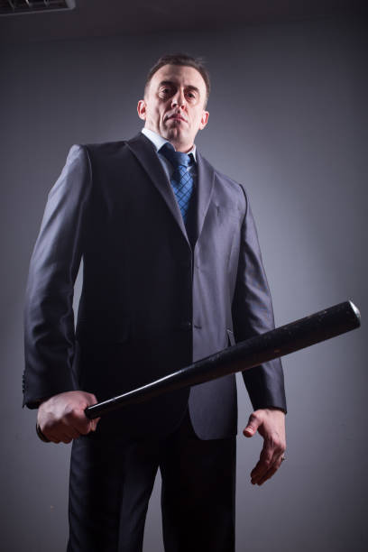 istock male gangster with baseball bat 639510852