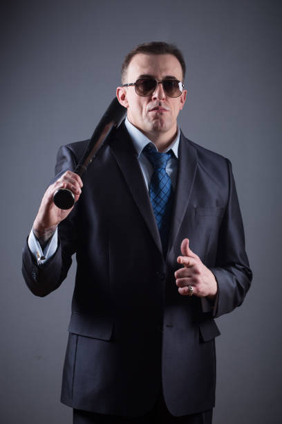 istock male gangster with baseball bat 639510886
