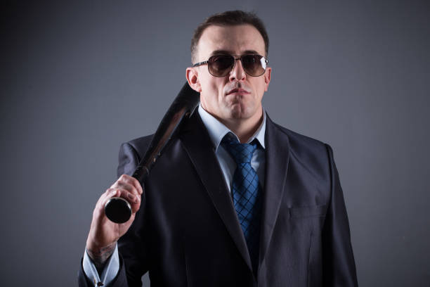 istock male gangster with baseball bat 639510914