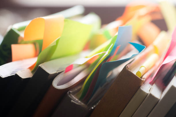 istock books and notebooks with multicolored stickers 639511380