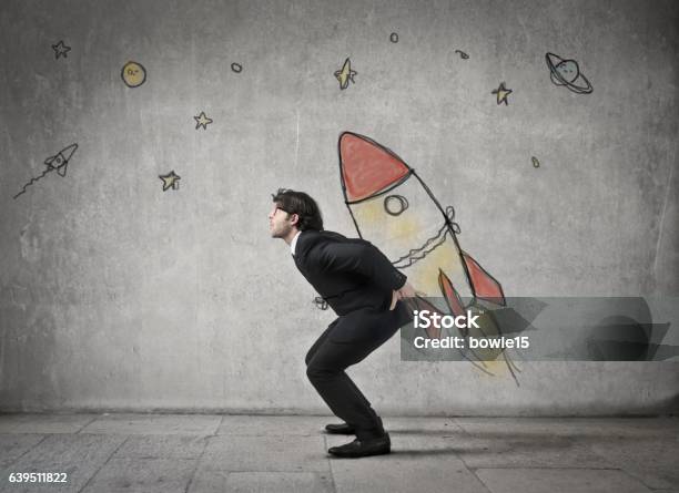 Man Is Carrying A Rocket Stock Photo - Download Image Now - Moon, Planetary Moon, Photographing