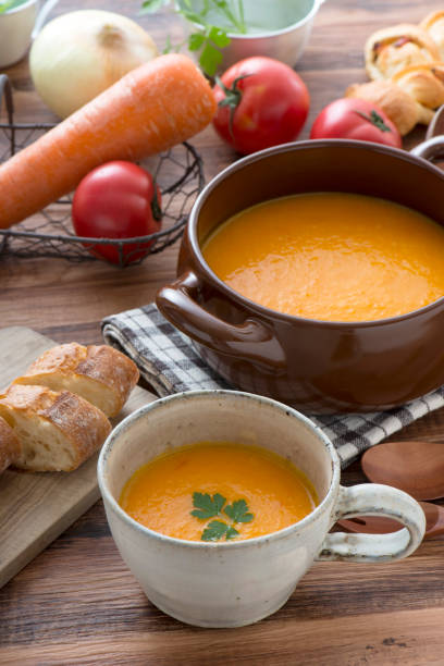 istock Pumpkin soup, vegetable and bread 639517928