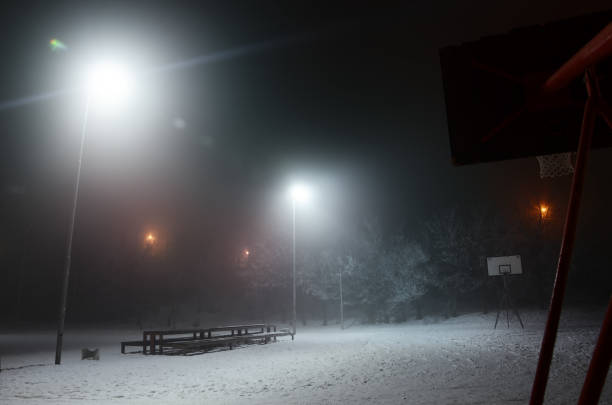 istock Basketball court in winter night. 639519222