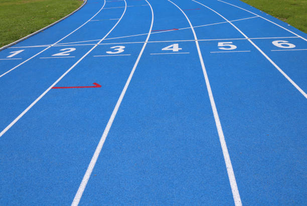 istock lanes of a blue athletic track with numbers 639519540