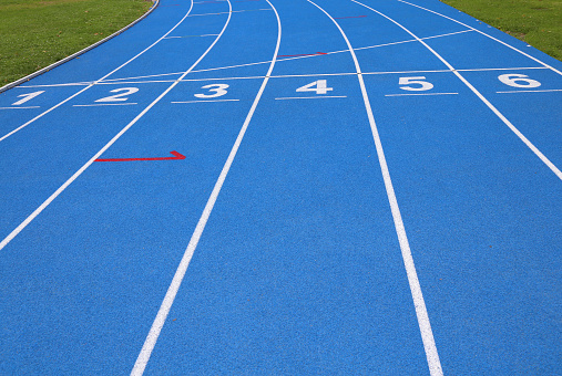 lanes of a athletic track with numbers one two three four five six