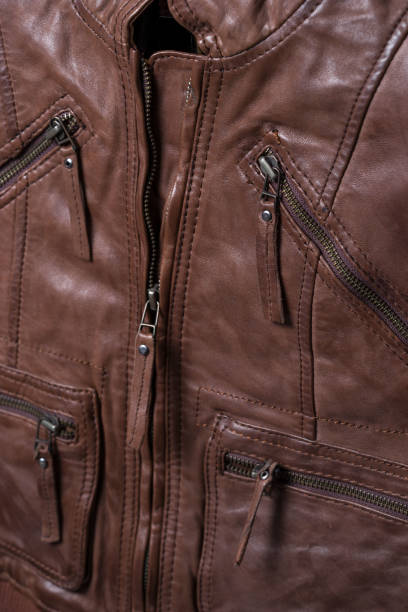 istock Brown textured leather jacket. Leather jacket macro details 639522136