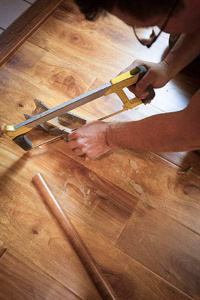 istock Installing Wood Flooring - cutting 639523070