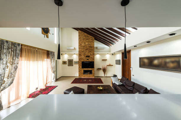 istock Intrior design of modern loft apartmentnt with fireplace 639523230