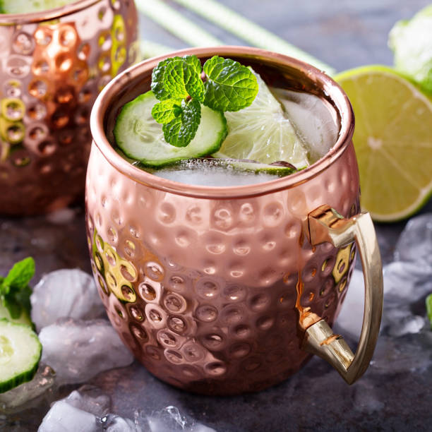 istock Moscow mule cocktail with lime and cucumber 639524510