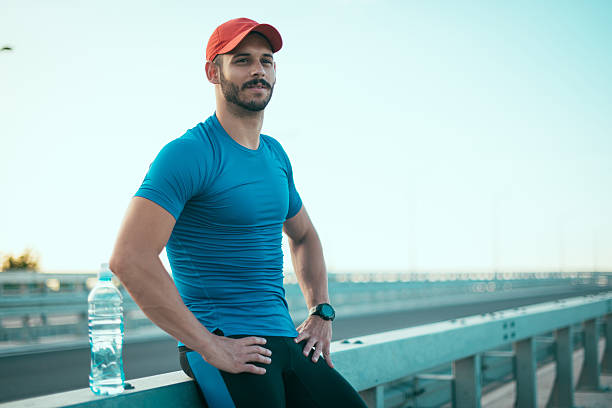istock Satisfied athlete resting after outdoor training 639525454