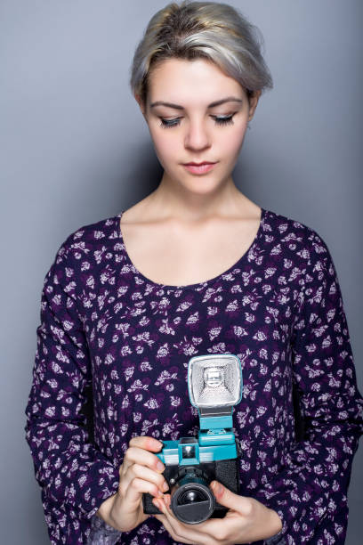 istock Hipster Art Student with Retro Plastic Film Camera 639528274