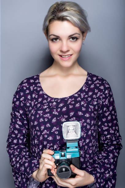 istock Hipster Art Student with Retro Plastic Film Camera 639528362