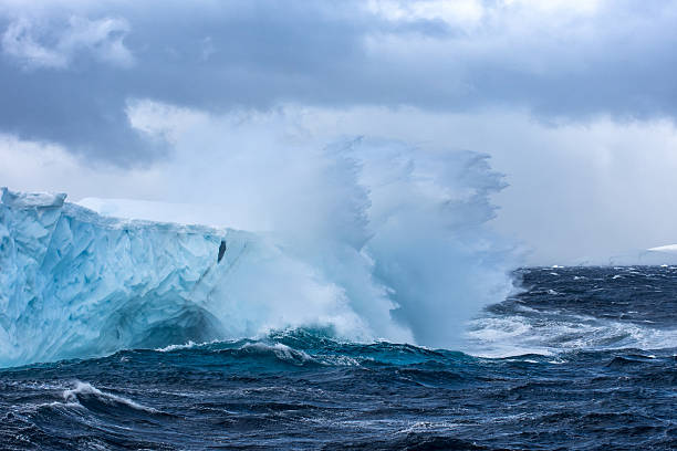 istock Massive Iceberg floating in Antarctica in a storm 639529436