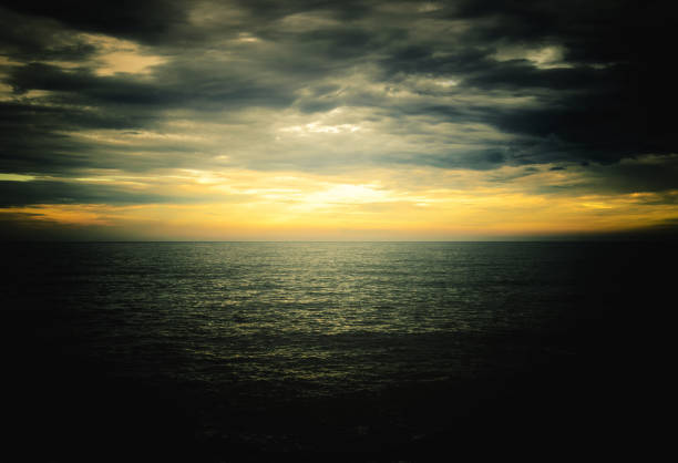 Sunset over the sea with a dark vignette
