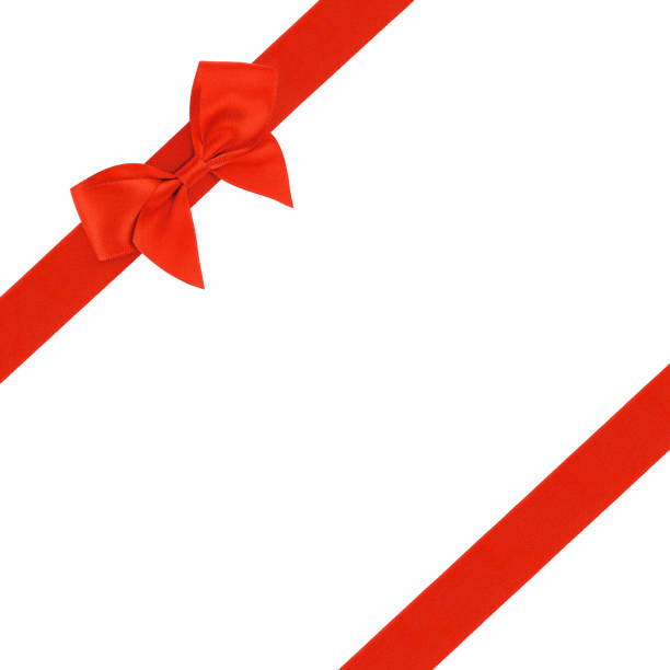 istock Red ribbon with bow isolated on white background 639537026