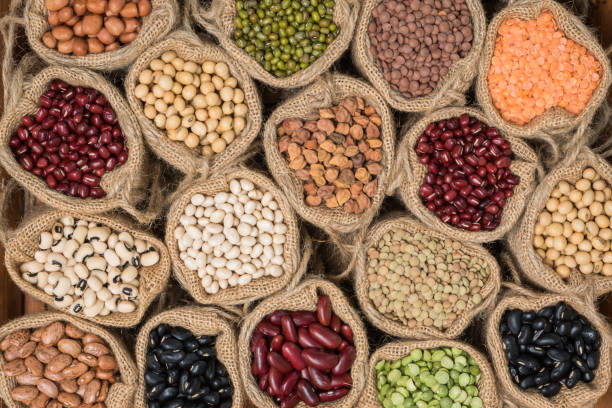 istock Various dry legumes in a sack cloth, Multicolor dry legumes 639537308