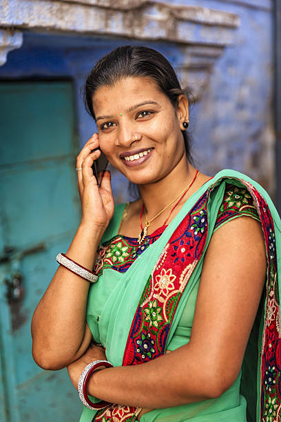 istock Young Indian woman using mobile phone, Jodhpur, India 639538610