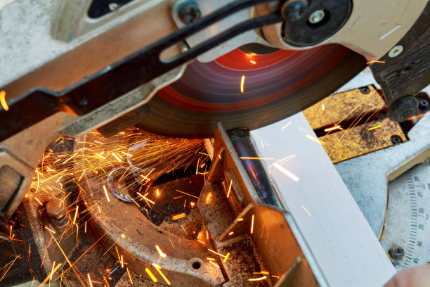 istock Close-up of worker cutting metal with grinder. 639539106