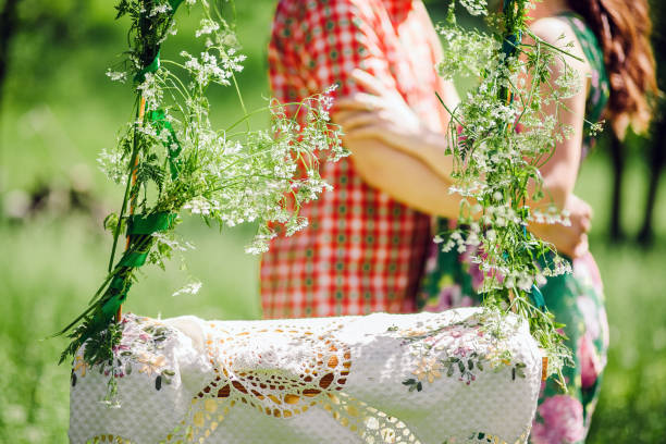 istock couple sitting on swing in park 639539112