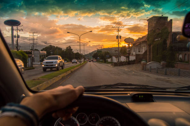 istock Driving at sunset. View from the driver angle,car focusoutside 639539482