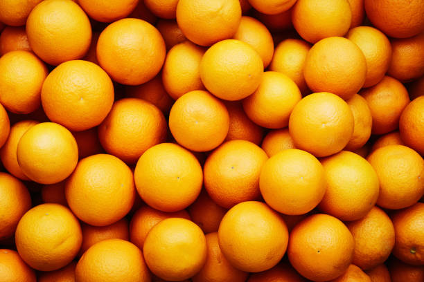 pilha de laranja - healthy eating multi colored orange above - fotografias e filmes do acervo