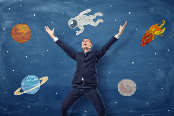 istock Businessman standing with his arms up and space sketches behind 639544932