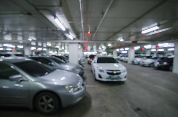 istock Abstract blur parking car indoor for background. 639545386