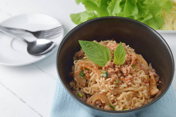 istock Instant noodle with spicy minced pork salad 639545668