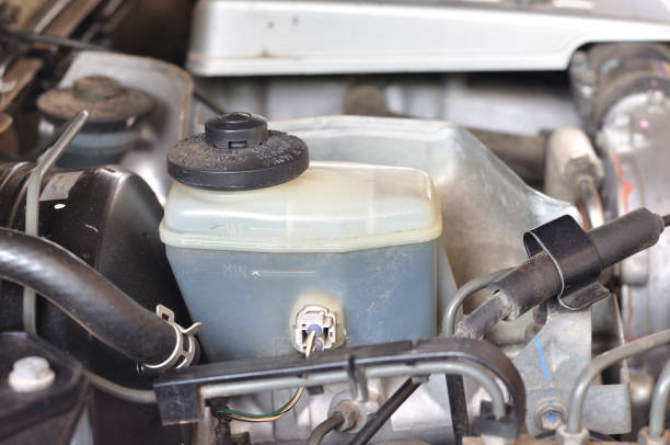 istock Brake and gear fluid bottle in engine room, maintenance. 639548796