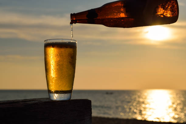 istock Glass of beer on a sunset 639550186