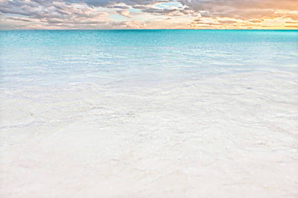 istock Sea coast water on the sand and clouds horizon 639552920