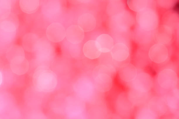istock Pink background with bokeh defocused lights 639553416