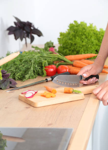 istock Fresh vegetables on the cutting board are falling in the 639555372