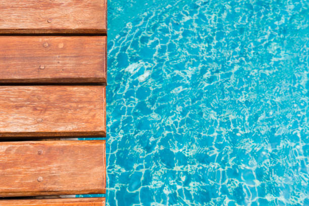 istock Bridge over the swimming pool in resort 639555444