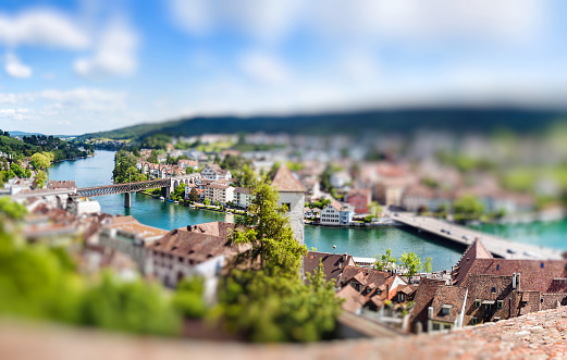 Panoramic view of Swiss town Schaffhausen. River Rhine. Europe. Miniature tilt shift lens effect.