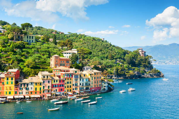 Beautiful sea coast in Portofino, Italy Beautiful sea coast with colorful houses in Portofino, Italy. Summer landscape portofino stock pictures, royalty-free photos & images