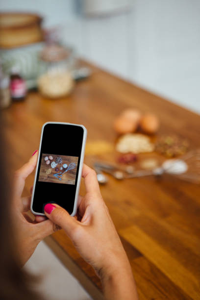 istock Hands taking photo of organic ingredients 639564728