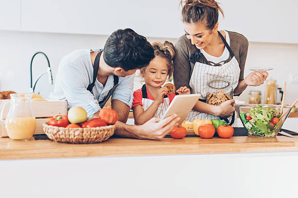 istock Family with one child and digital tablet 639568806