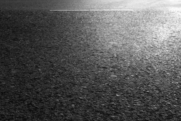 istock Asphalt road textured closeup background. 639569680