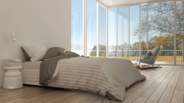 istock Classic bedroom, minimalistic white interior design, big windows 639571100