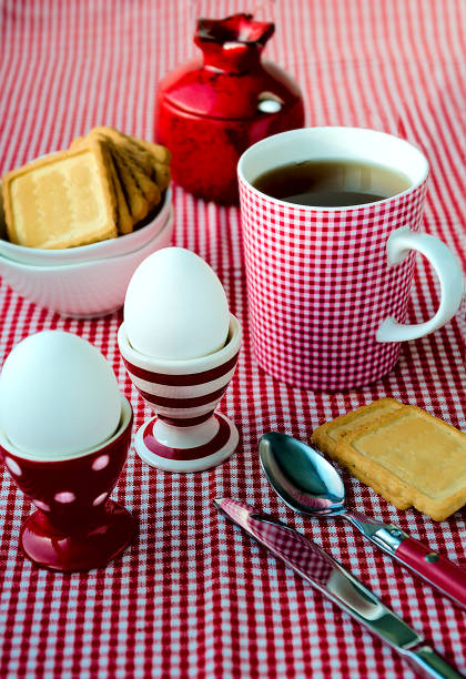istock Hard boiled eggs with tea and cookies 639571930