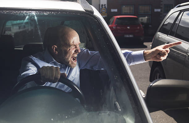 istock Motorist points his finger during road rage 639573228