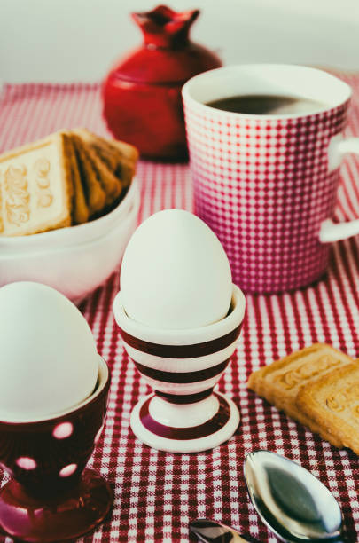 istock Hard boiled eggs with tea and cookies 639574122