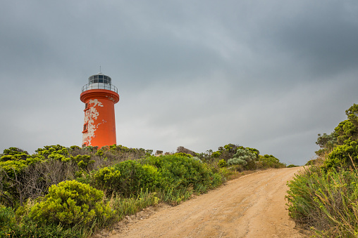 Red lighthouse in Canunda National Park, South Australian natural coastline landscape