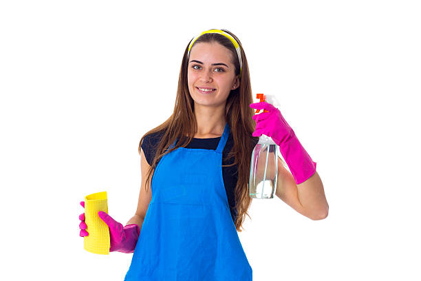 istock Woman holding detergent and duster 639575904