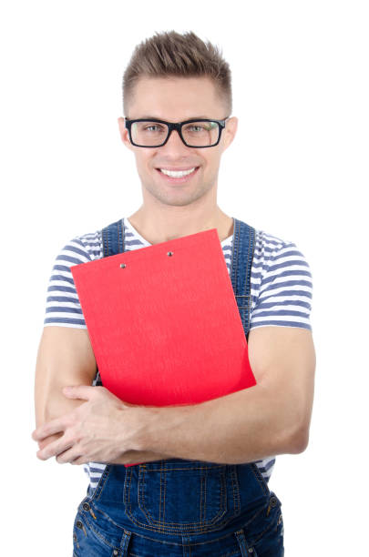 istock Young attractive man holding a clipboard. Smile and joy. 639576010