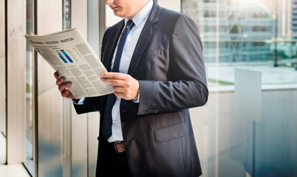 istock Business Man Working Reading Newspaper Concept 639578656